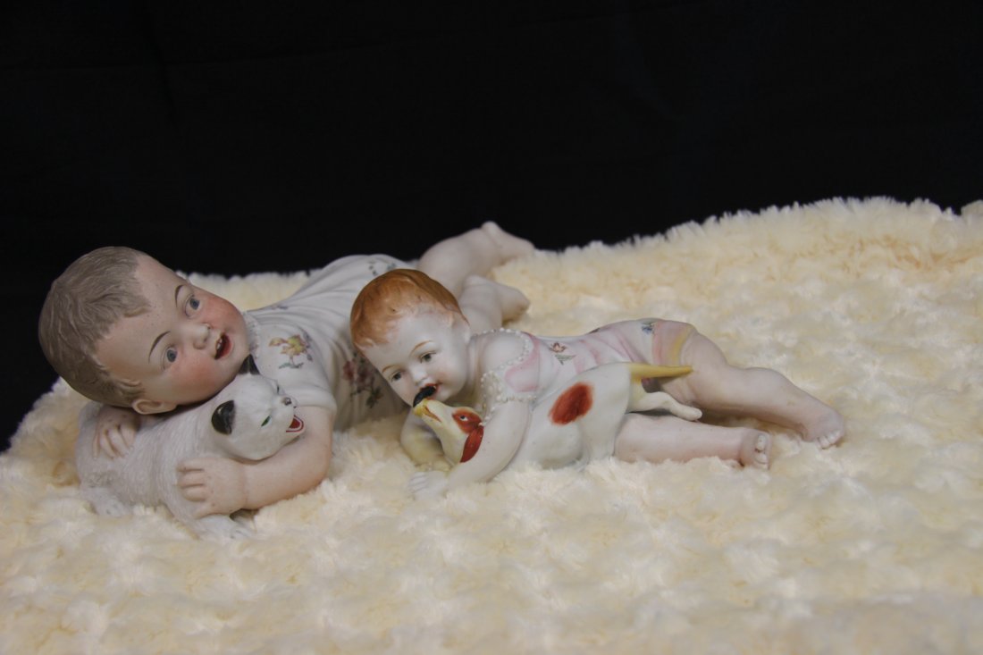 Unmarked German Piano Babies - Heubach ? -: Unhappy Kitty Baby 11" Unmarked No Damages Seen, Piano Baby With Puppy 8" Unmarked Seems to Have Repaint to One of its Hands, No Damages Seen. Although unmarked, piano babies are most likely attribute