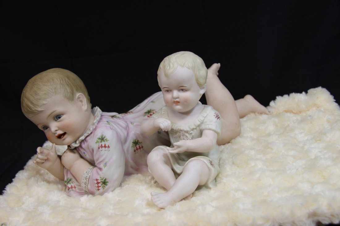 Lot of Two Heubach Piano Babies: No Damages Seen To Them, Largest One is 18", The one Sitting is 7 1/2" Tall.