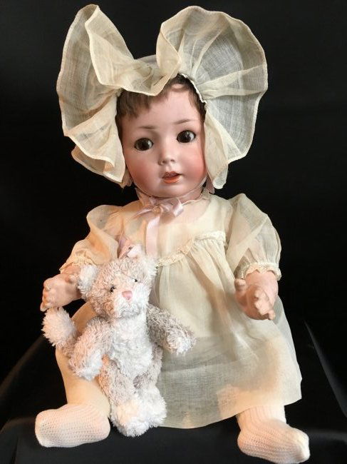 German Antique Character Baby: 16" antique character baby attributed to Schoenau & Hoffmeister. Brown sleep eyes with natural lashes. Open mouth with 2 upper teeth. Original mohair boyish wig, is thin in spots. No damages to bisque