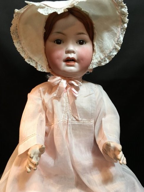 22" German PM Character Baby: German PM (Porzellanfrabrik Mengersgereuth). Inicised PM/914/12. Brown sleep eyes, open mouth with two teeth. No hairlines or damages to bisque. Tiny white spots on right cheek. Red auburn mohair wig.