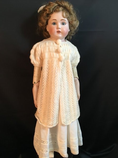 29" Antique Turned Shoulder Head: Delicate features on this antique turned shoulder head. Blue sleep eyes, open mouth with teeth. No hairlines or damages to bisque, one tiny white spot on eyebrow. Vintage wig with plaster pate. Possib