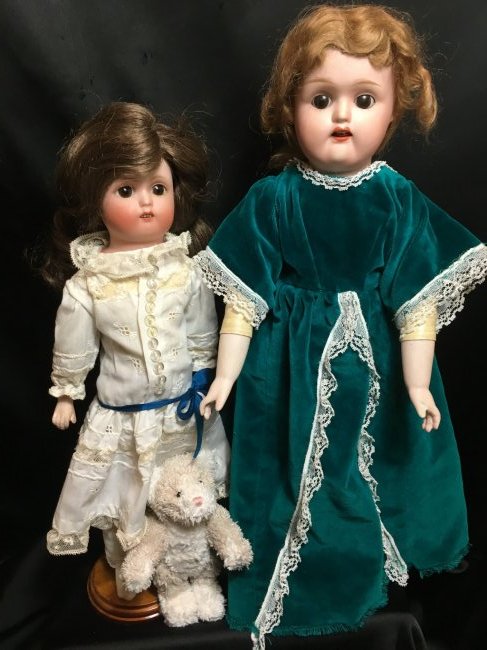 Lot of 2 Antique Nippon Bisque Shoulder Heads: 17" Morimura/Nippon/Japan bisque shoulder head with brown set eyes, open mouth with 4 teeth. Auburn mohair wig is thin in the back. No hairlines or damages to bisque. Original kid leather body is clea