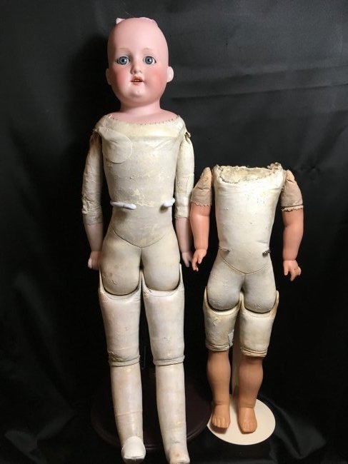 Antique Leather Bodied Doll & Leather Body: Lot consists of an antique leather bodied doll, 25 1/2" tall. Bisque head is incised ARMAND MARSEILLE/GERMANY/370/A6M. Blue sleep eyes, open mouth with teeth, cute chin dimple. No damages to bisque he