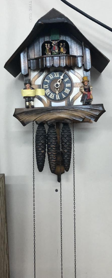 Vintage Cukoo Clock: Vintage Cukoo clock possibly german, 11" height with chain.