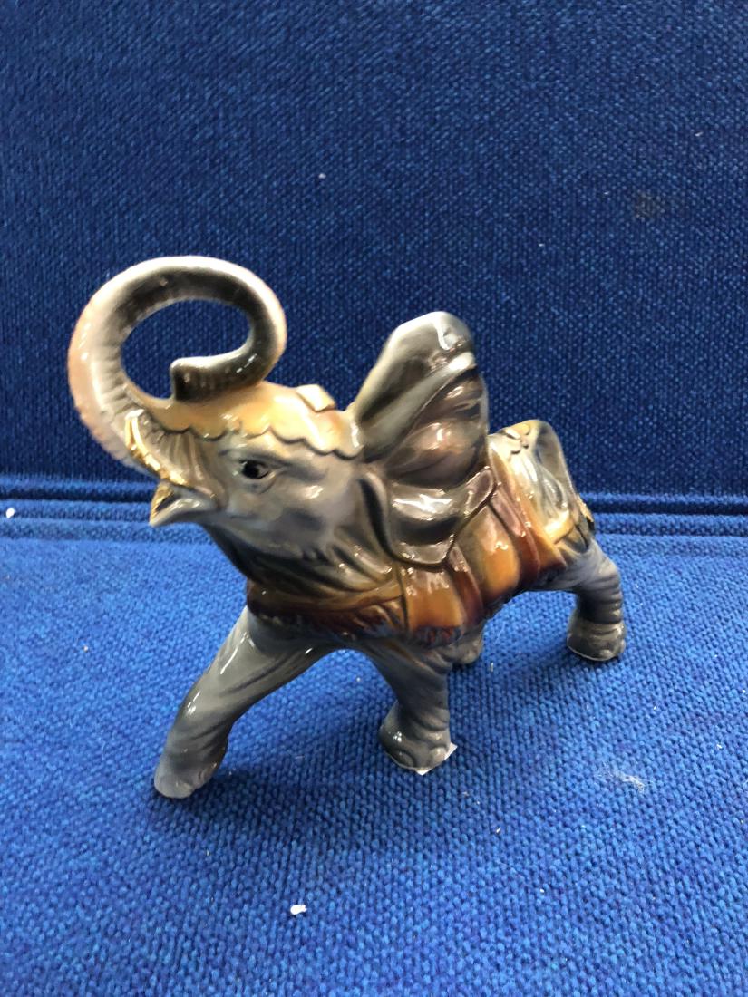 Italian Ceramic Elephant Statue: Measures 10" L and no damage. Stamped made in italy on underside.
