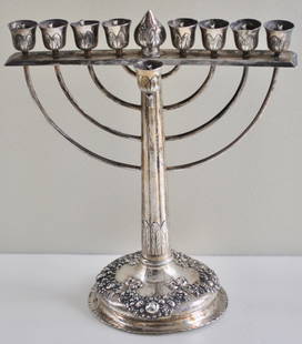 Continental 800 Silver Menorah 19th Century: European 800 silver Menorah 19th century . It measures 11 1/2 inches high and 10 wide15.8 Troy ounces.