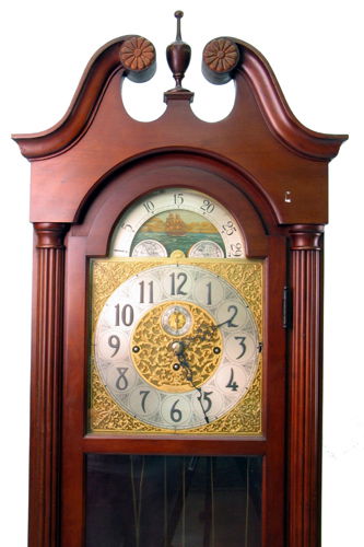 A MAHOGANY CASED FIVE-TUBE HALL CLOCK, Herschede C: A MAHOGANY CASED FIVE-TUBE HALL CLOCK, Herschede Clock Co., model 217, c. 1955-57. The Chippendale-style case houses an 8-day, 3-weight movement that strikes Westminster chimes on 5 graduated metal tu