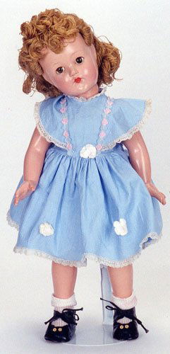 AN EFFANBEE "ANNE SHIRLEY" DOLL, circa 1942-1945,: AN EFFANBEE "ANNE SHIRLEY" DOLL, circa 1942-1945, all composition construction, sleep eyes, original clothing, yarn hair used during WWII due to materials shortages, height 17 in.