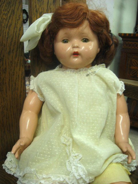 EFFANBEE MAE STARR DOLL, with musical mechanism im: EFFANBEE MAE STARR DOLL, with musical mechanism imprinted "Mary Had a Little Lamb", human hair wig, composition head, arms and legs, yellow romper with organdy overdress, 30 in. ht.