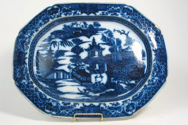 HEAVY FLOW BLUE ENGLISH IRONSTONE PLATTER, large s: HEAVY FLOW BLUE ENGLISH IRONSTONE PLATTER, large size, in the Blue Willow pattern, 19th century, 20 in. by 15 in.