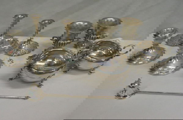GROUP OF 9 STERLING SILVER TABLE ACCESSORIES: pai: GROUP OF 9 STERLING SILVER TABLE ACCESSORIES: pair toothpick holders, 2 3/4 in. height; pair candleholders, 2 1/2 in. height, pair cream and sugar, beaded rims, 2 1/2 in. height; pair pierced candleho