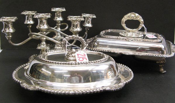 A GROUP OF 4 ENGLISH SILVER PLATED TABLE ACCESSOR: A GROUP OF 4 ENGLISH SILVER PLATED TABLE ACCESSORIES, including a pair of 3-light candelabra, 6-1/2 in. ht.; a rectangular covered serving bowl with divided interior and an oval vegetable bowl with li
