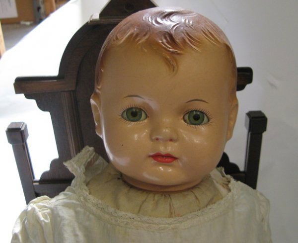 AN AMERICAN EFFANBEE BABY DOLL AND VICTORIAN: AN AMERICAN EFFANBEE BABY DOLL AND VICTORIAN STYLE DOLL BED. The Effanbee doll, "Sugar Baby", marked on the back of head, composition arms and legs, cloth body, 21 in., sleep eyes, painted features, o
