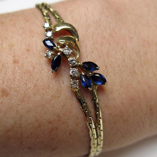 SAPPHIRE, DIAMOND AND 14 KARAT GOLD BRACELET