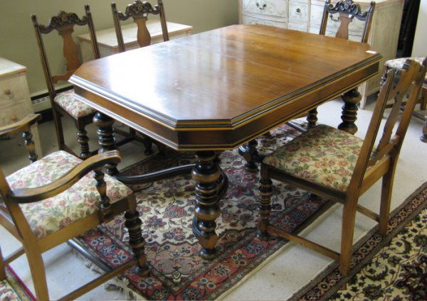 WALNUT AND MAHOGANY DINING TABLE AND CHAIR SET, R: WALNUT AND MAHOGANY DINING TABLE AND CHAIR SET, Renaissance Revival style, American, c. 1930's, comprising: rectangular dining table and six matching chairs with floral cushion seats.