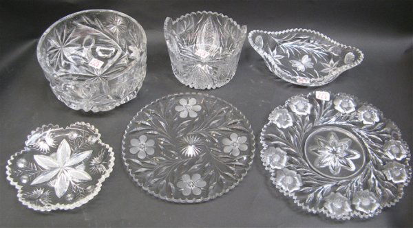 AMERICAN BRILLIANT CUT CRYSTAL TABLE ACCESSORIES,6: AMERICAN BRILLIANT CUT CRYSTAL TABLE ACCESSORIES,6 pieces: heavy berry bowl on 3 feet, 7-1/2" dia.; 3 serving plates in different patterns, 10-1/2", 8-3/4" and 7" dia.; a wine holder, raised handles,