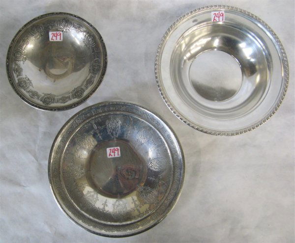 THREE STERLING SILVER TABLE ACCESSORIES: Weidlich: THREE STERLING SILVER TABLE ACCESSORIES: Weidlich engraved shallow bowl, 10" dia.; Graff, Washbourne & Dunn pedestal compote, engraved cartouches of flowers, 7-1/2" dia.; together with a round bowl, 1