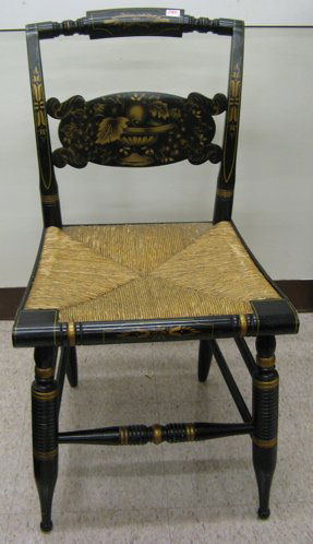 A SET OF FOUR SIGNED HITCHCOCK DINING CHAIRS, Ame: A SET OF FOUR SIGNED HITCHCOCK DINING CHAIRS, American, 20th century. The set has an ebonized finish with gold stencil decoration, rush seats, and L. Hitchcock gold stenciled block letter signature al
