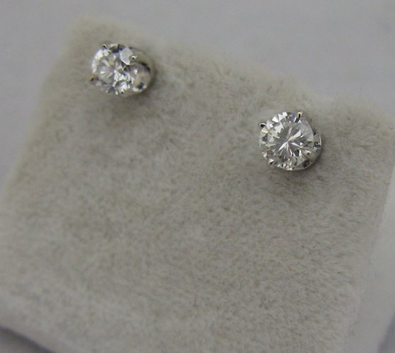 PAIR OF DIAMOND AND 14 KARAT WHITE GOLD EAR STUDS