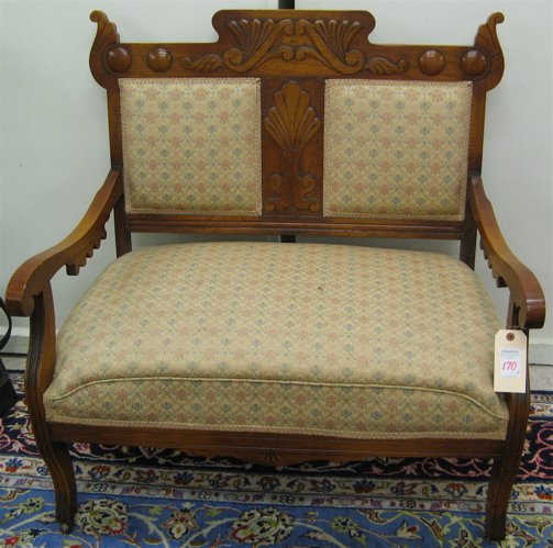 LATE VICTORIAN OAK SETTEE AND MATCHING ARMCHAIR