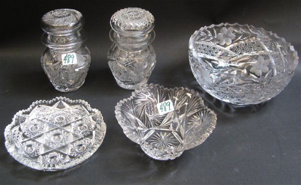 SIX AMERICAN CUT CRYSTAL TABLE ACCESSORIES: inclu: SIX AMERICAN CUT CRYSTAL TABLE ACCESSORIES: including a cut and floral engraved berry bowl, 8" D.; two jars with fitted lids in complementary patterns, one signed J. Hoare Co., Corning; a candy bowl,