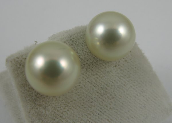 PAIR OF PEARL AND 14K GOLD EAR STUDS, each set wi