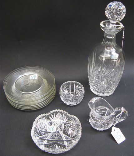 TWELVE CUT GLASS TABLE ACCESSORIES, including a d: TWELVE CUT GLASS TABLE ACCESSORIES, including a decanter, 12" H.; 8 dessert plates, 6-1/4" D.; shallow candy dish, 5-1/4" D.; together with a cream pitcher, 3-1/4" H., and matching open sugar bowl, 2"