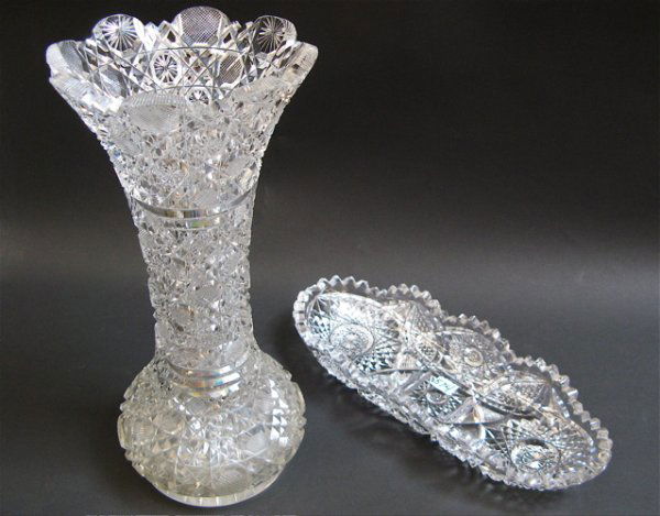TWO AMERICAN CUT CRYSTAL TABLE ACCESSORIES, a lar: TWO AMERICAN CUT CRYSTAL TABLE ACCESSORIES, a large trumpet form vase, 12-1/4" H., together with an oval celery dish, 11-1/2" L. by 4-3/4" W.