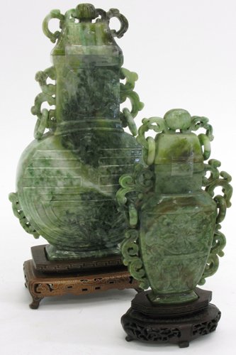 TWO JADEITE CHINESE SCULPTED COVERED URNS. The la
