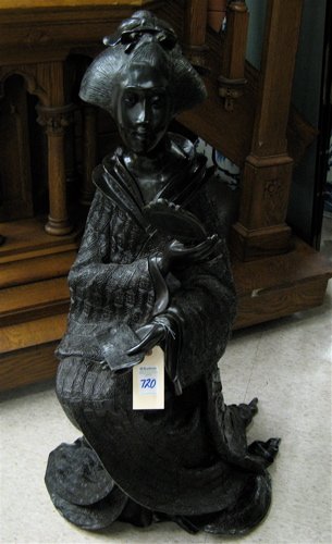LARGE FIGURAL BRONZE SCULPTURE, the seated figure