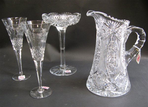 FOUR AMERICAN CUT CRYSTAL TABLE ACCESSORIES: wate: FOUR AMERICAN CUT CRYSTAL TABLE ACCESSORIES: water pitcher 10-1/2" H.; tall compote, 9-1/2" H.; plus two Waterford signed toasting goblets, 9-1/4" H.