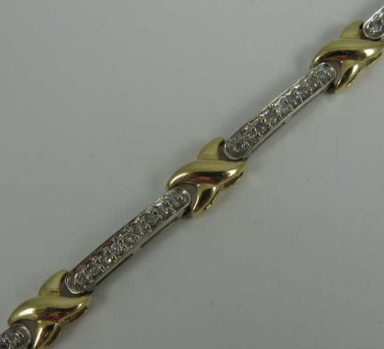 DIAMOND AND 10K YELLOW AND WHITE GOLD BRACELET, 7 - 2