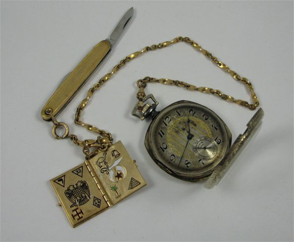 POCKET WATCH, CHAIN, POCKET KNIFE AND GOLD BOOK FO: POCKET WATCH, CHAIN, POCKET KNIFE AND GOLD BOOK FOB. The watch is an Elgin model 2, size 14, serial #22144795, c. 1920; the small 2-blade pocket knife is 10K gold; the fob, a 14K gold Masonic Temple "