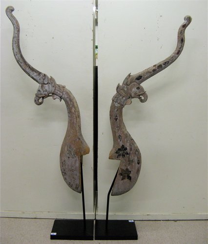 A PAIR OF CARVED WOOD GUARDIAN FIGURES, Southeast