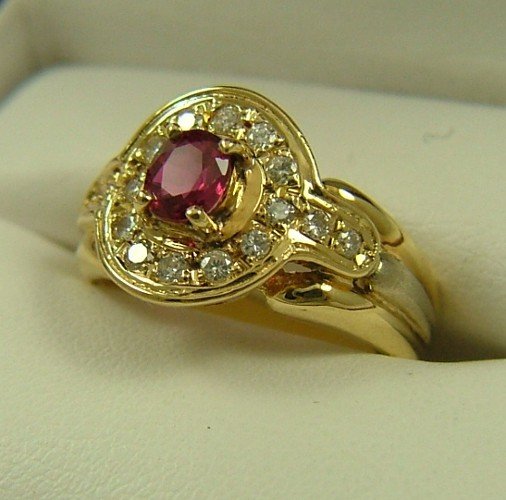 RUBY, DIAMOND AND FOURTEEN KARAT GOLD RING, cent