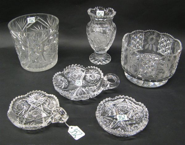 SIX CLEAR CUT GLASS TABLE ACCESSORIES: ice bucket: SIX CLEAR CUT GLASS TABLE ACCESSORIES: ice bucket, 6" H. by 6-1/4" D.; round footed bowl 4-3/4" H., by 7" D.; vase, 7" H.; together with 3 shallow candy dishes.
