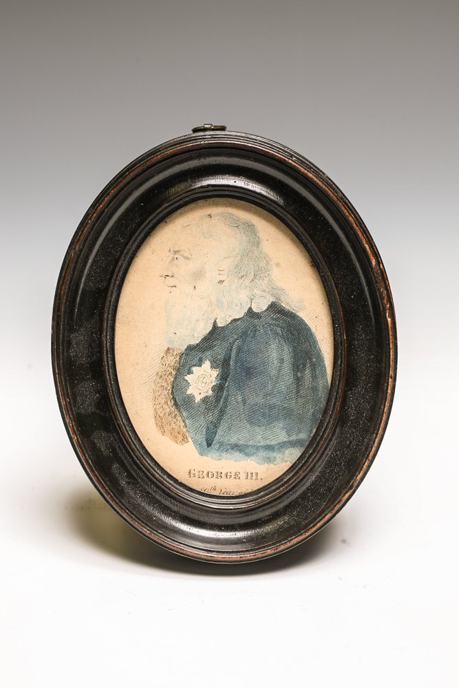 Rare George III Lithograph: An early hand tinted lithograph portrait of King George III in the 80th year of his life; a bearded portrait associated with his passing in 1820. Presented in period oval wood frame.