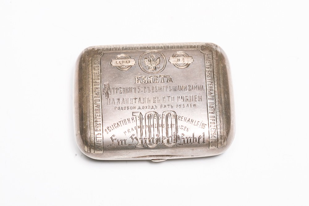 Imperial Russian Silver Coin Purse #1: A small hand chased Imperial Russian silver coin purse with red fabric lining, hand chased with a facsimile of a 100 ruble banknote on the front,and the number 200,000 on the reverse. Hallmarked on fr