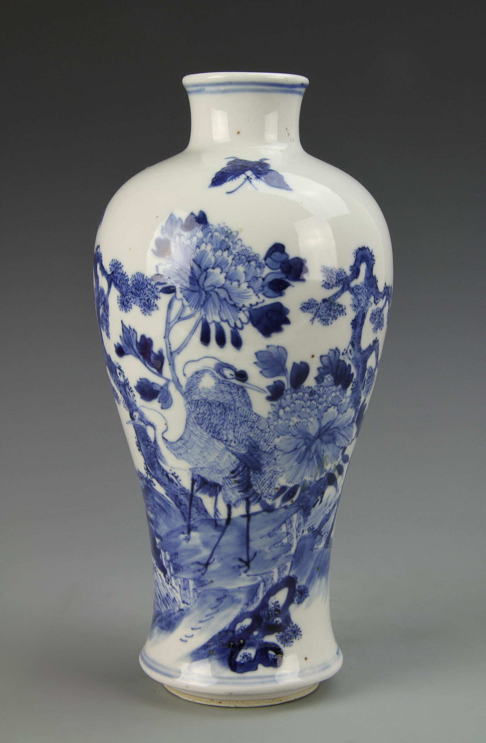 Chinese Blue and White Meiping Vase: 19th C., small mouth and neck with wide shoulders, elaborately decorated with birds and a variety of flowers and plants, mark on base. Height 10 1/4 in.