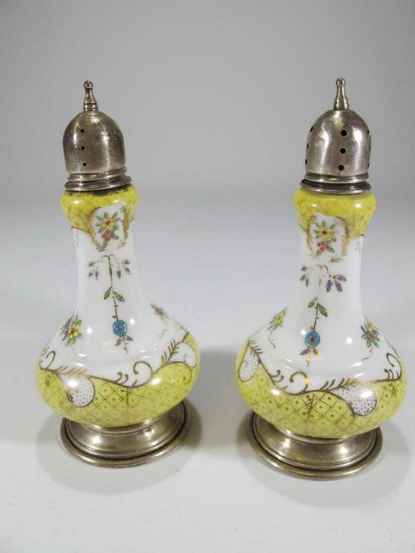 Antique Sterling & porcelain salt & pepper containers: Antique Sterling & porcelain salt & pepper containers. 5 3/8 in H x 2 1/2 in W.