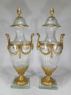 Marked Baccarat pair of bronze & glass urns: Marked Baccarat pair of bronze & glass urns. 22 1/2 in H x 7 in W x 6 1/2 in D.