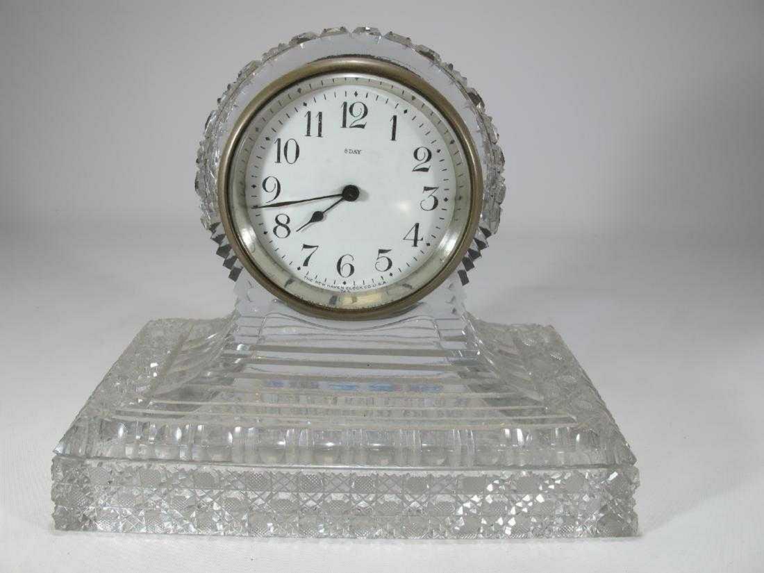 The New Haven glass 8 days mantel clock: The New Haven glass 8 days mantel clock. 8 in H x 9 3/4 in W x 5 in D.