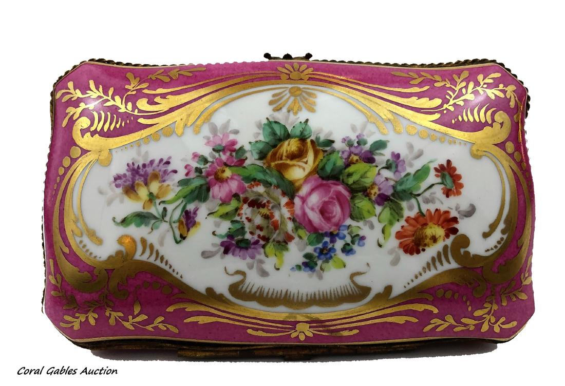 Sevre and bronze porcelain box: Sevre and bronze porcelain box. Measure 1 1/2"in H x 6"in W.