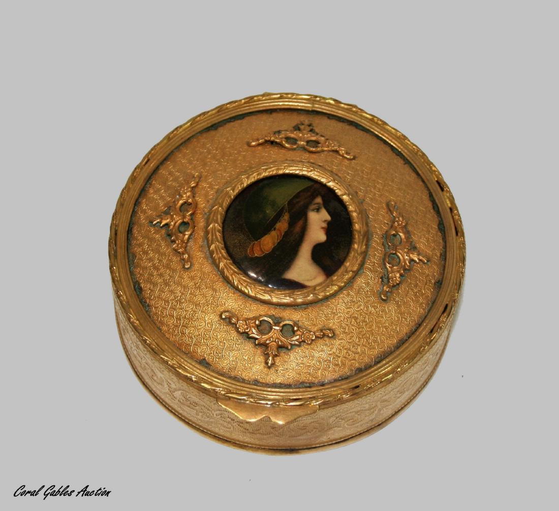 Antique French Bronze Box w/ Enamel on Copper Portrait: Antique French bronze Box w/ enamel on copper portrait. Very decorative bronze work Â .The box is velvet lined. Â It is in very good condition, Nice round shape. The size is 4 1/2" round.The ename
