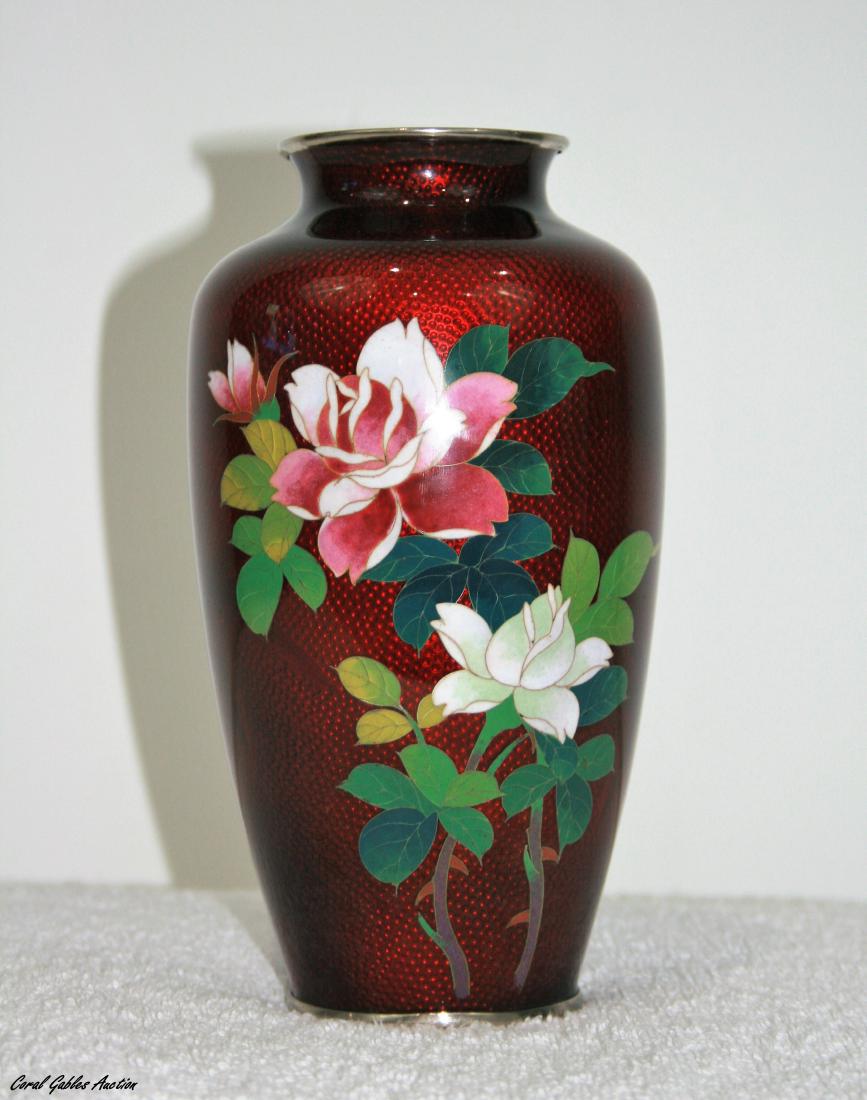 Antique Japanese cloisonne with beautiful flower: Antique Japanese cloisonne with beautiful flower designs. CloisonnÃƒÂ© (French pronunciation: [klwazÃ‰â€ne]) is an ancient technique for decorating metalwork objects. In recent centuries, vi