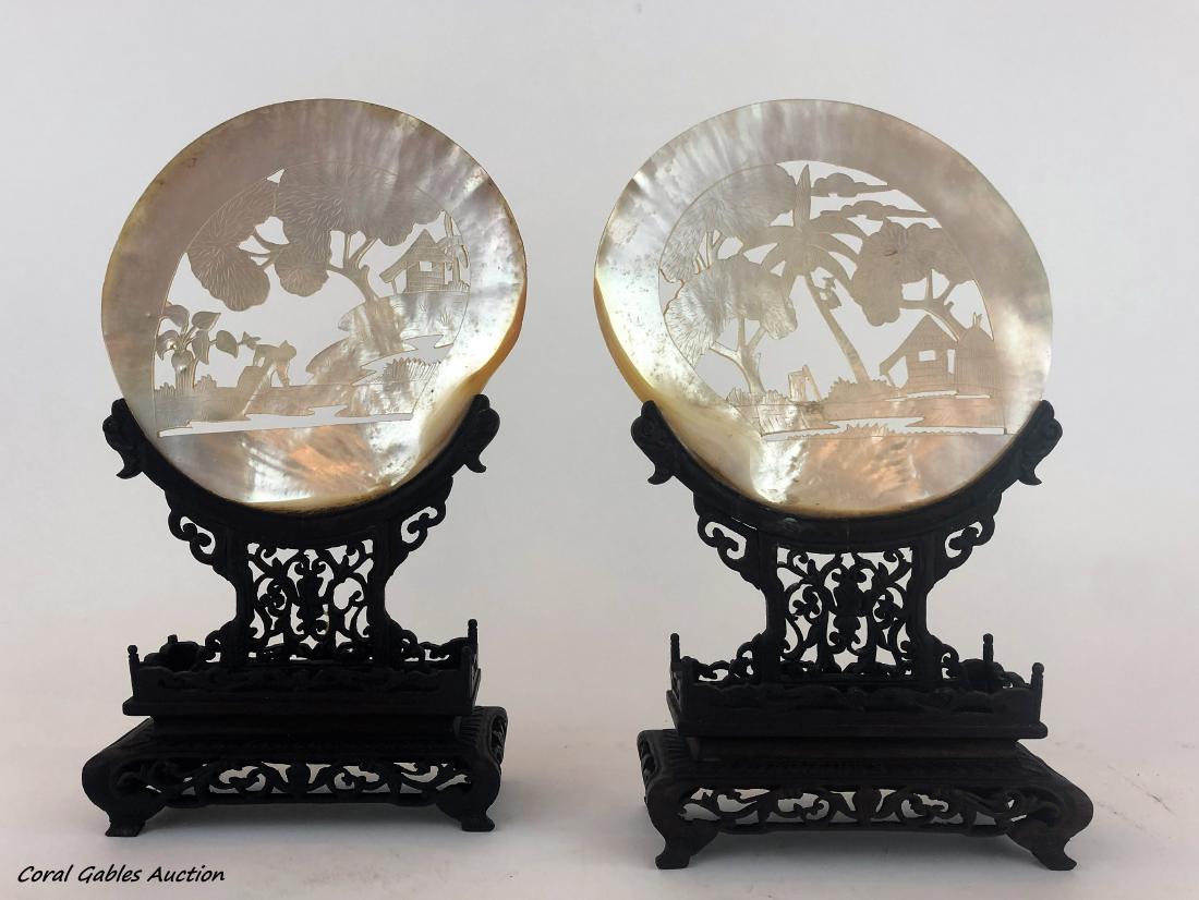 Chinese couple of mother pearl and ebony: Chinese couple of mother pearl and ebony. Measure 10 1/4" in H X 6"in W.