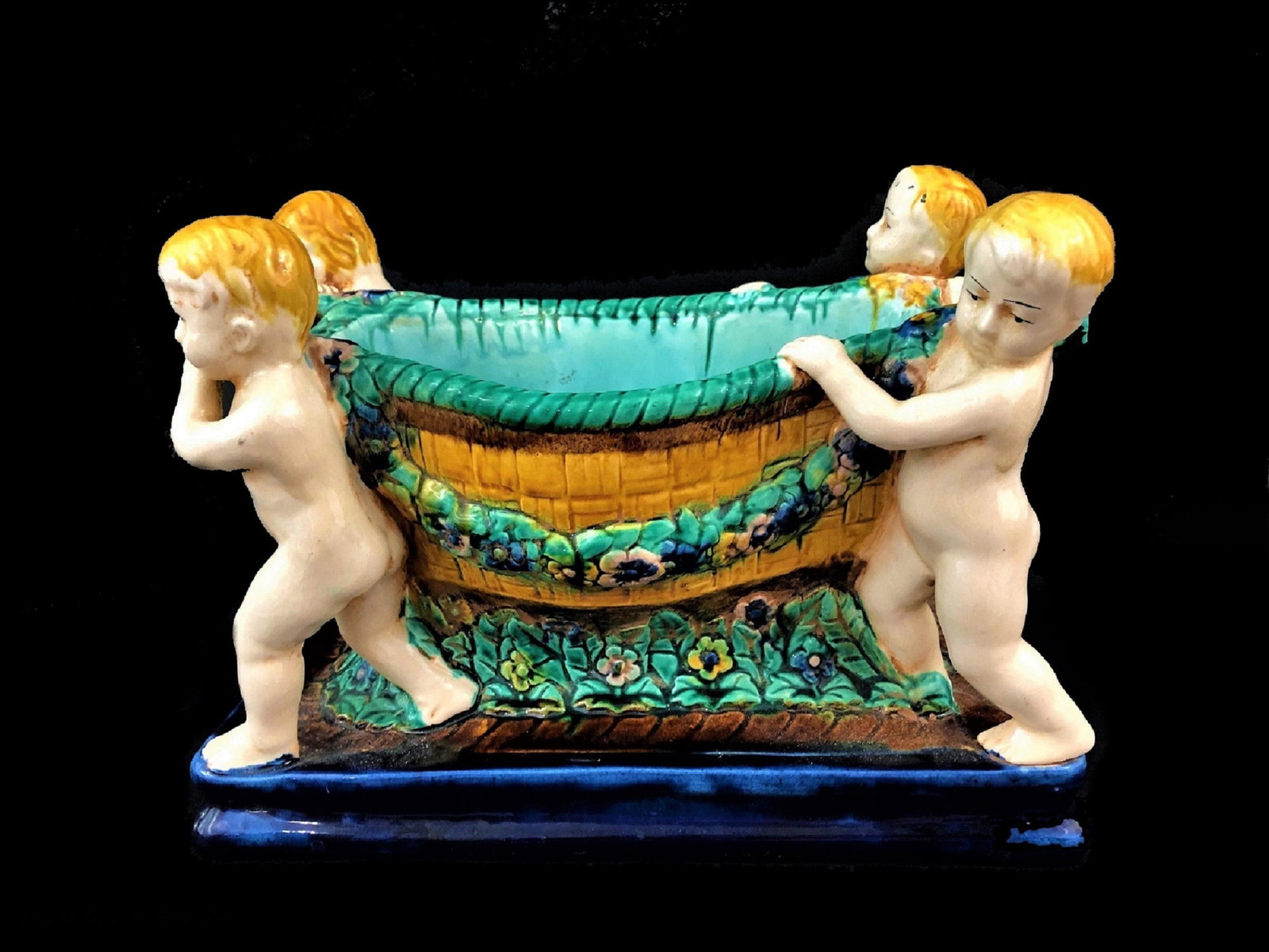 A Minton Style Majolica Center Piece: A Minton Style Majolica Center Piece. Measure 8 1/2"in H x 12 1/2"in W x 6 1/2"in D.