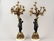 PAIR OF PATINATED AND GILT BRONZE FIGURAL FOUR LIGHT CA