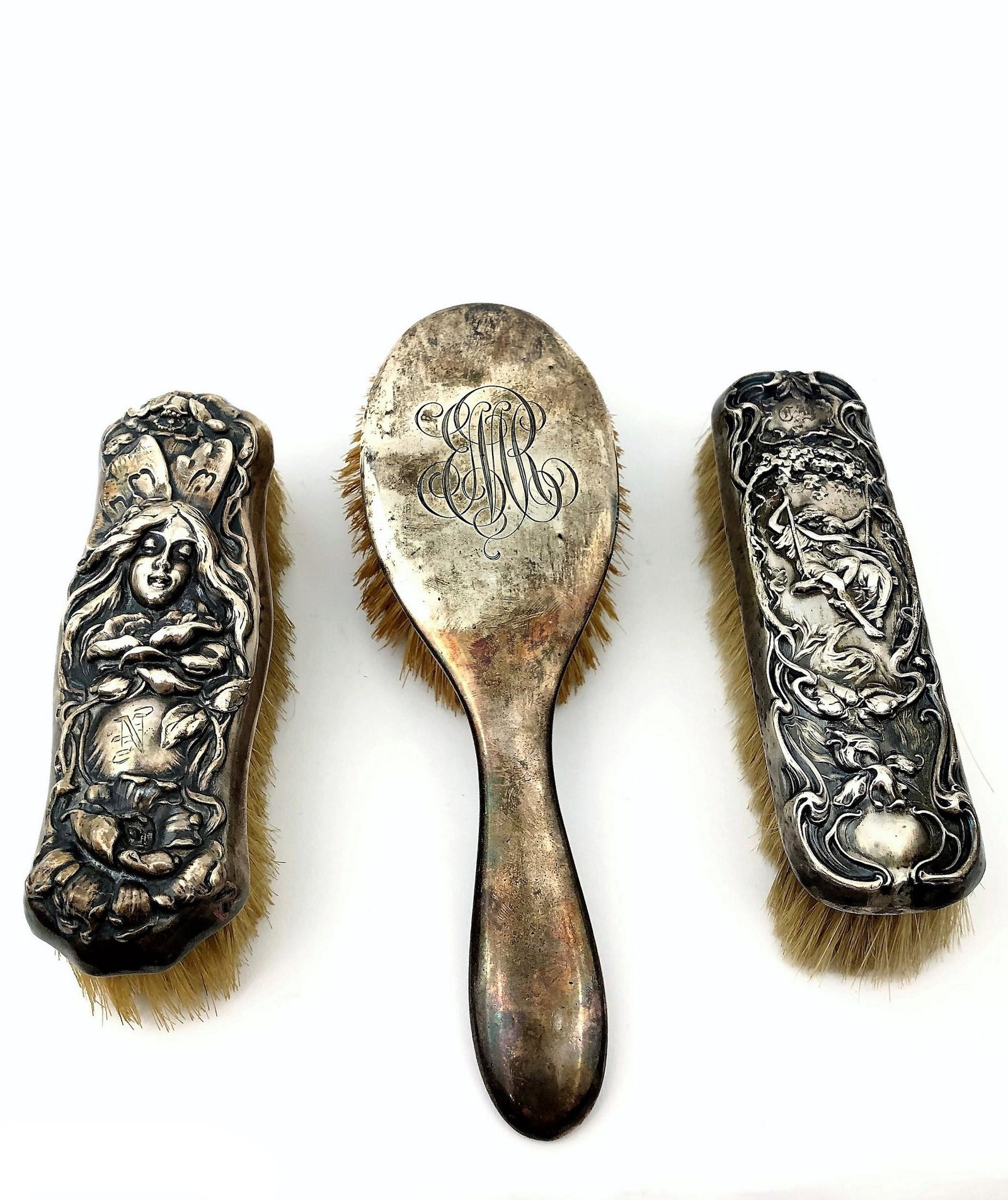 Three Victorian sterling silver brushes (1 of 6)