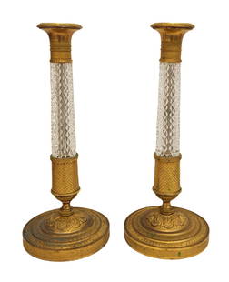 Pair of Antique French Empire Baccarat Style Gilt Bronze & Cut Crystal Candlesticks: Pair of Antique French Empire Baccarat Style Gilt Bronze & Cut Crystal Candlesticks Measure 11 1/2"in H x 4 3/4"in Diameter Elegant pair of antique French Empire style candlesticks featuring finely cu